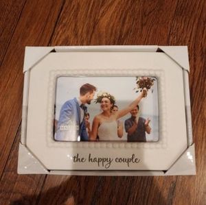 The happy couple wedding frame